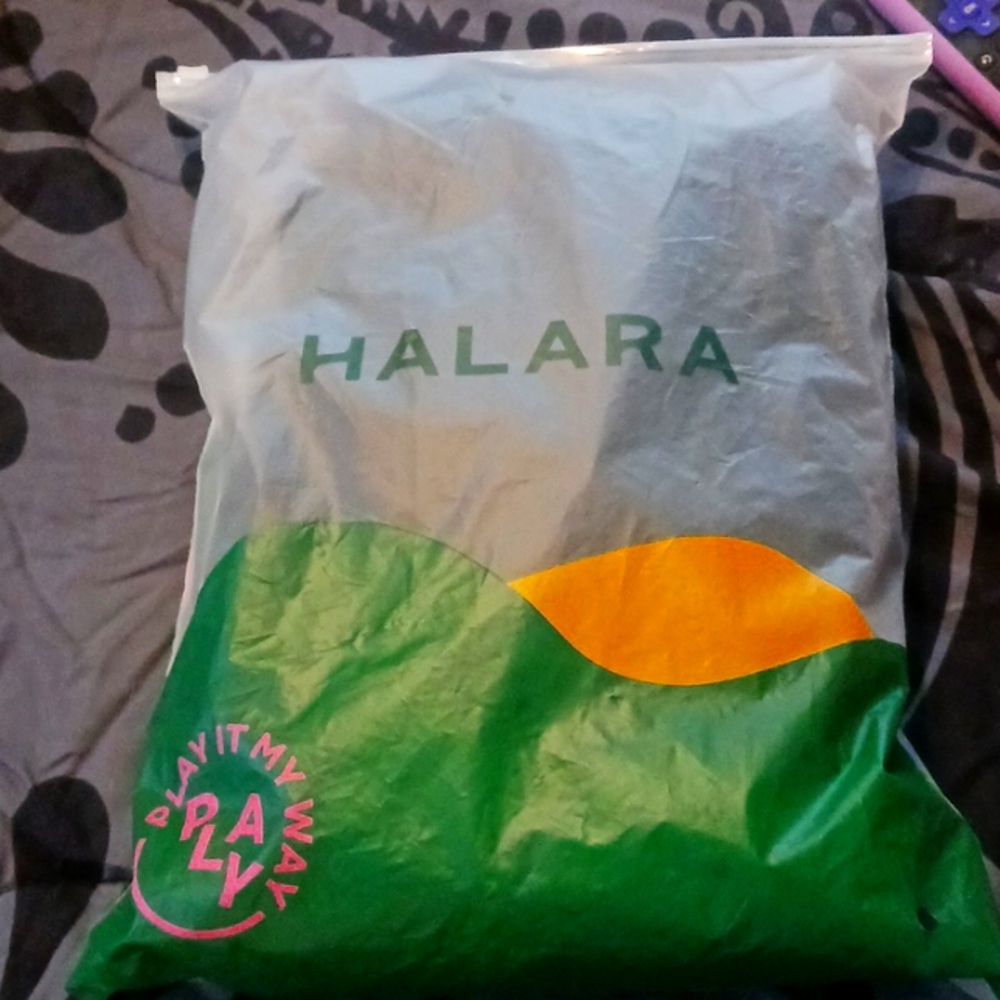 Halara brand black overall jumpsuit with pockets